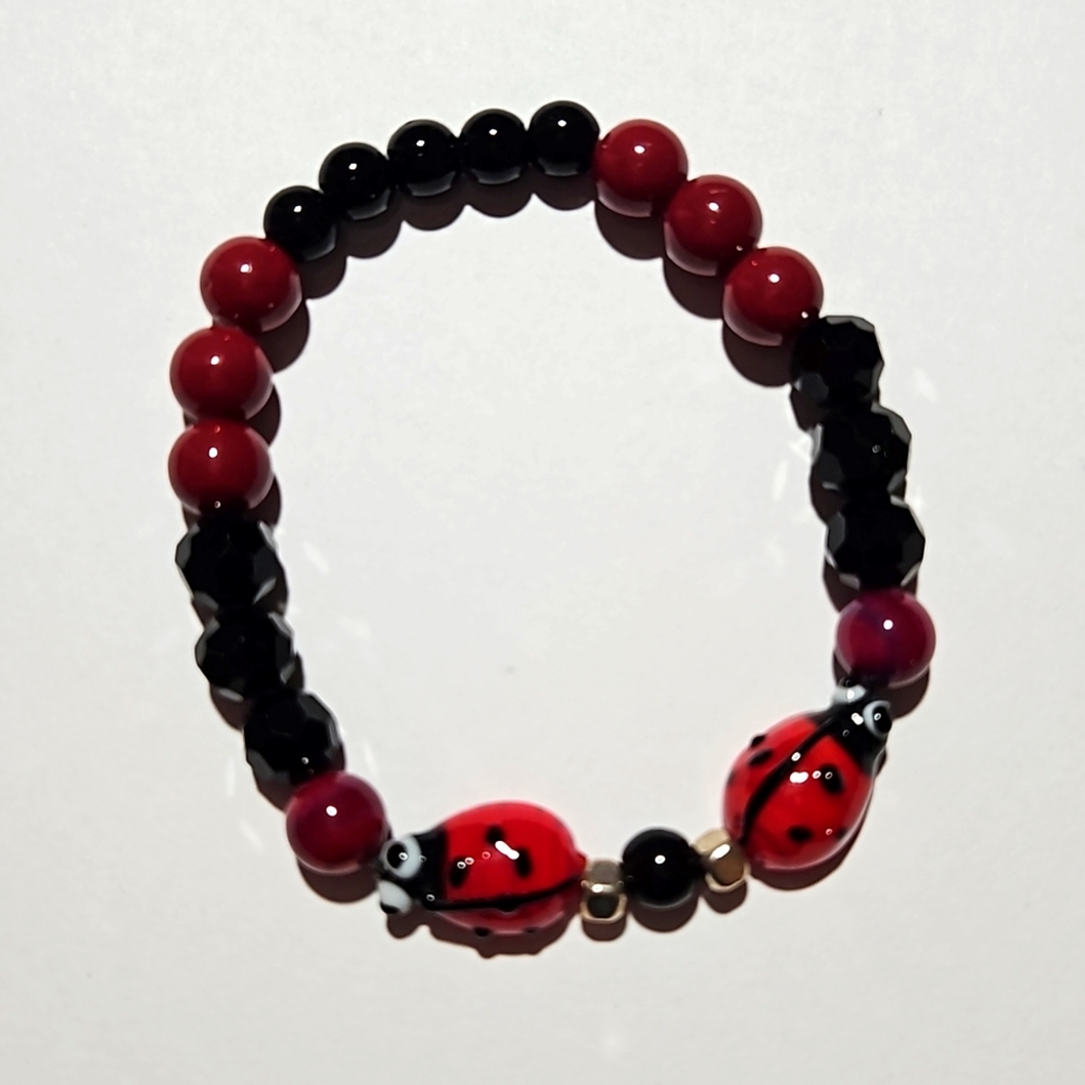 Black and red ladybug stretch bracelet